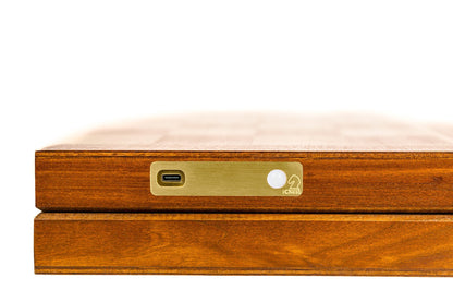 iChessOne side panel with USB-C port, control button, and status light